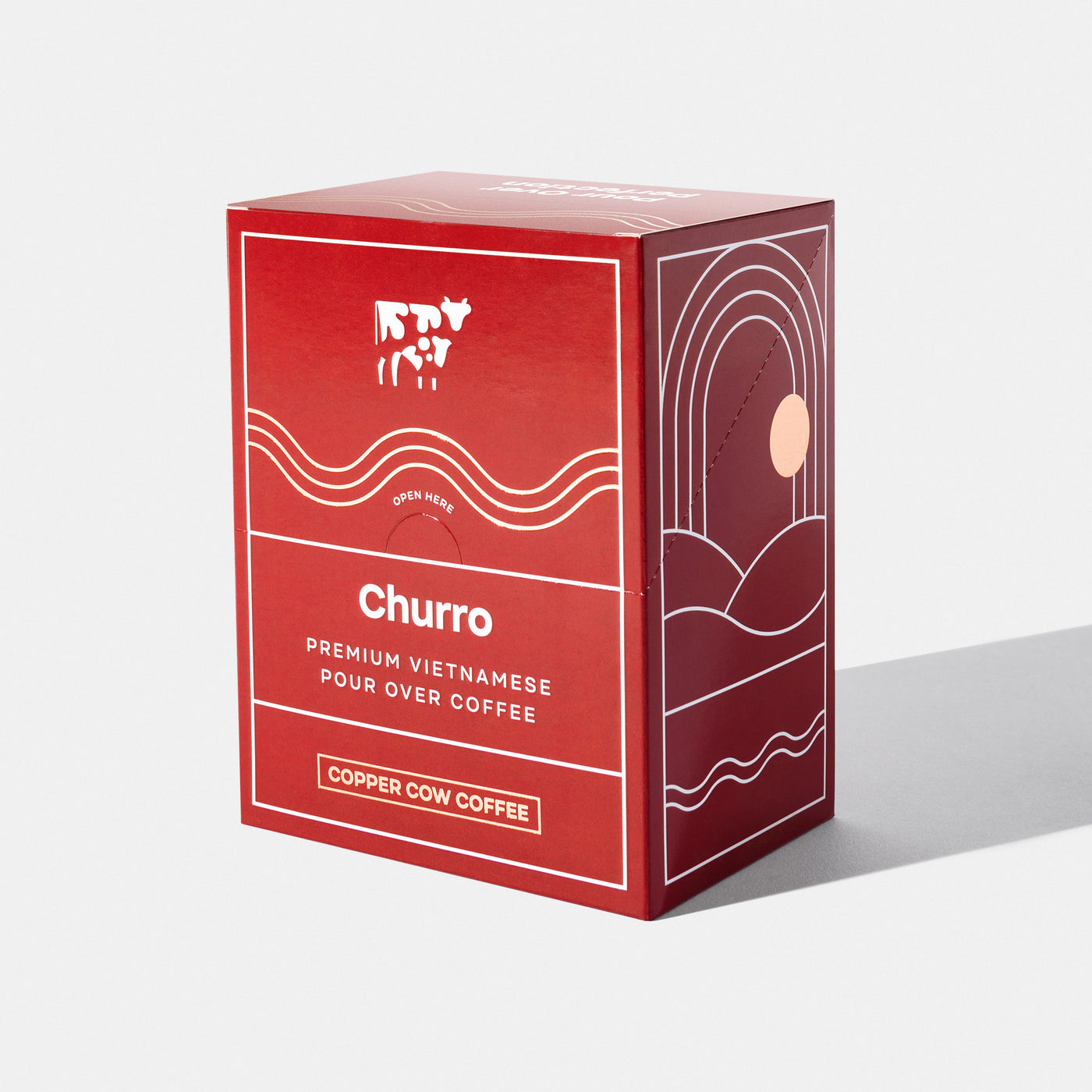 8-Pack of Churro Vietnamese Coffee single-serve pour over pouches in closed box.